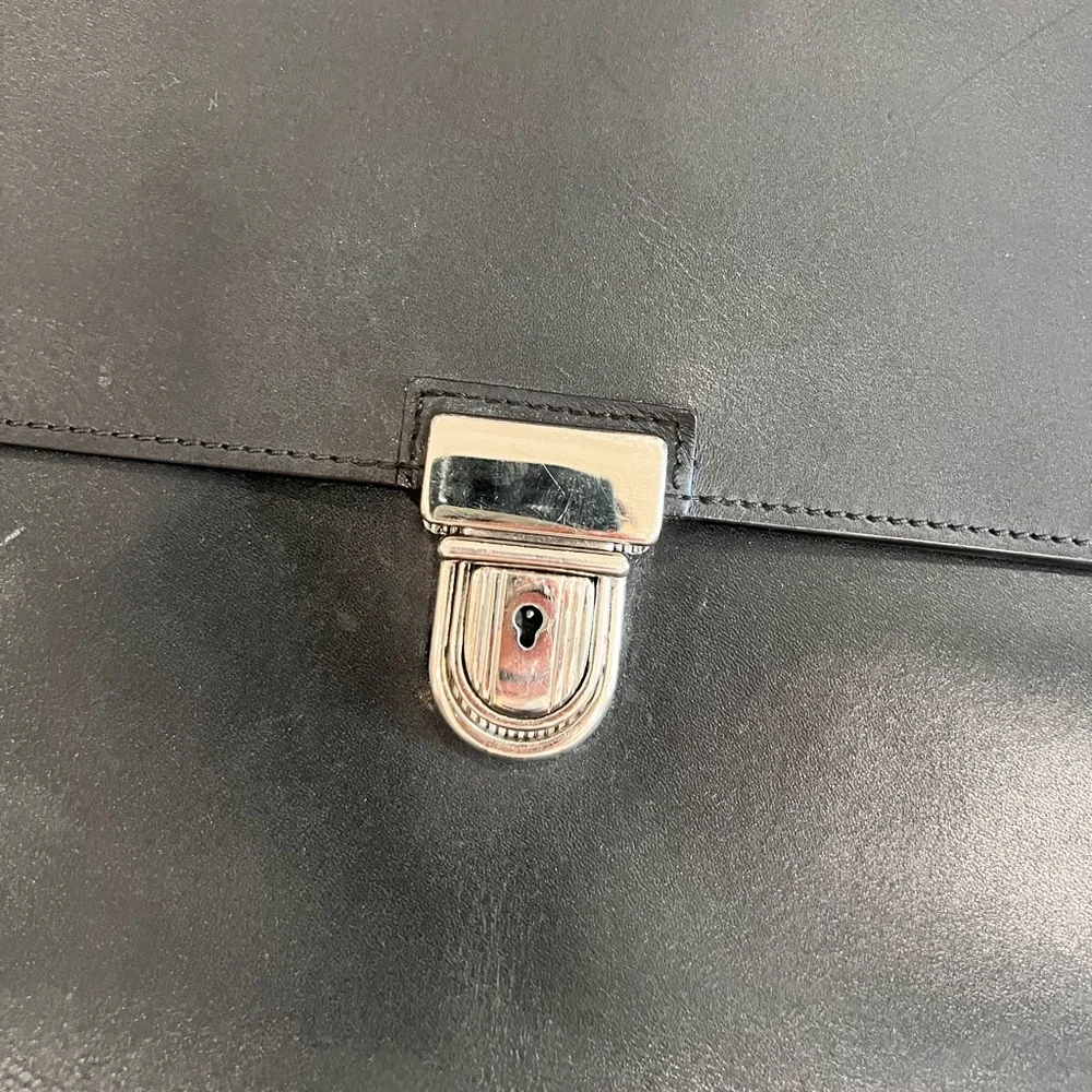 John Varvatos men’s leather briefcase.